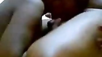 Horny mumbai kaamwali bai sucking her master cock in lounge lying naked in bed and man plays with her tits and fingers her choot.