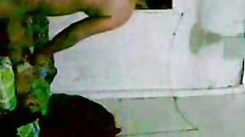 South indian aunty lying wearing chaddi squeezing her lovely tits while her guys gets on top to cum on her in this must watch MMS.