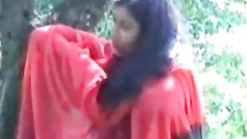 Indian bitch flashing her tits and blowing a cock.