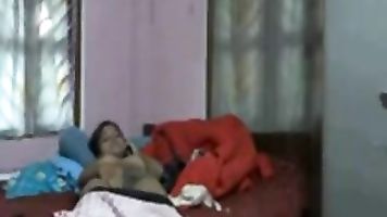 Indian GF talking on the phone and masturbating.