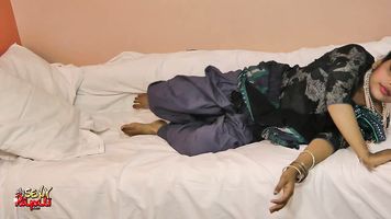 Rupali in bed in blue Indian shalwar suit teases then masturbates until her admirer explodes all over her pussy.